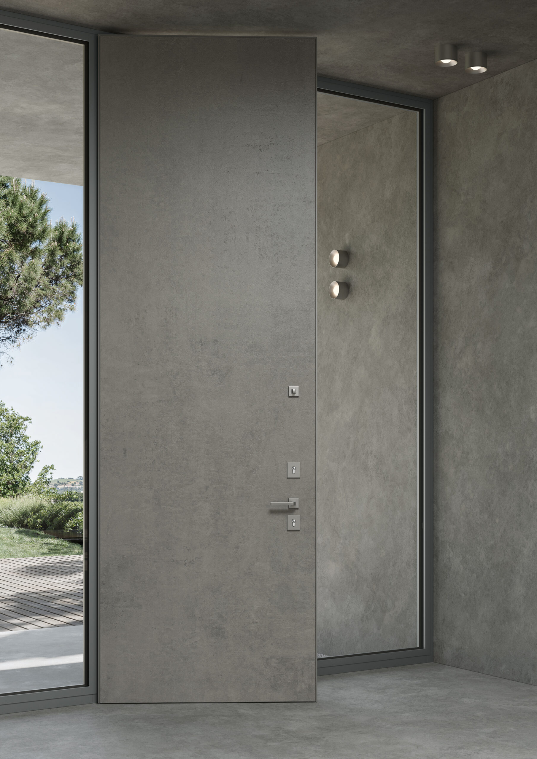 Porta in cemento a vista con serratura e interruttore, ambientazione moderna con vista su giardino, infissi di alta qualità a Firenze