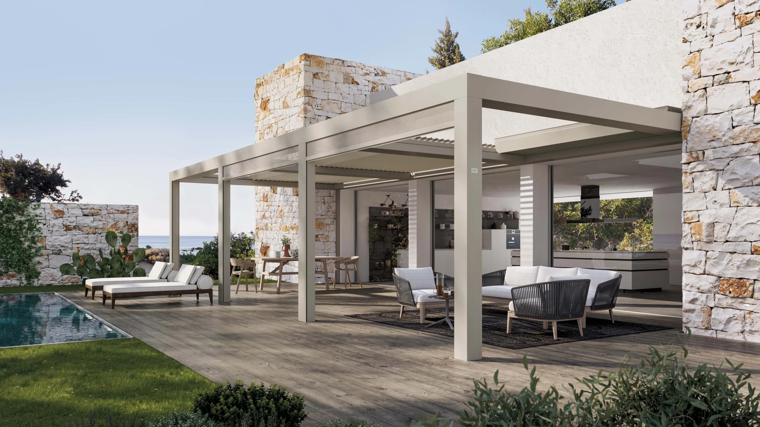 Veranda elegante con vista mare, arredata con mobili moderni e cactus in giardino, piscina sullo sfondo